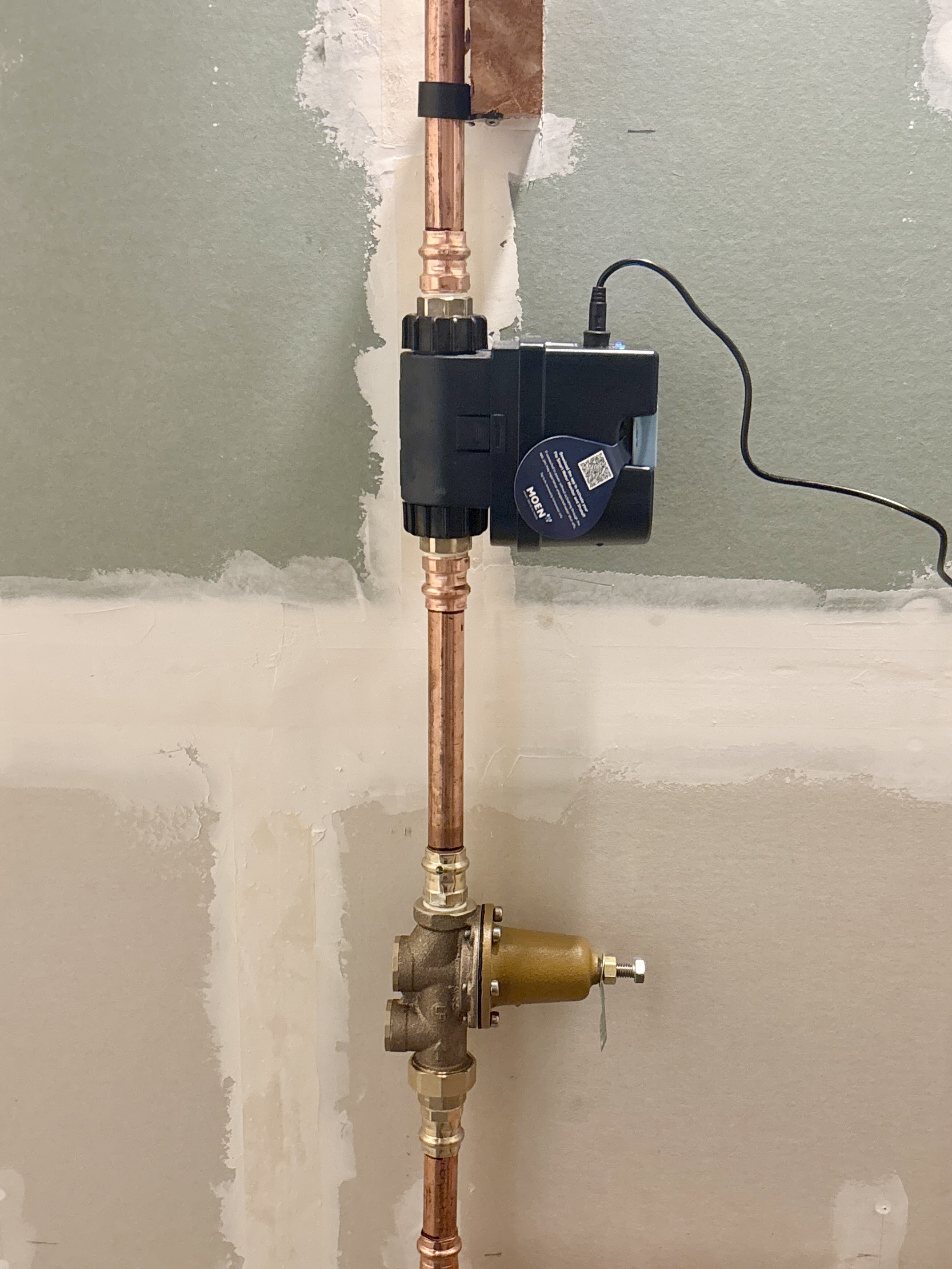 Flo by Moen smart water monitor and shut-off valve installation on a residential plumbing system in West Vancouver
