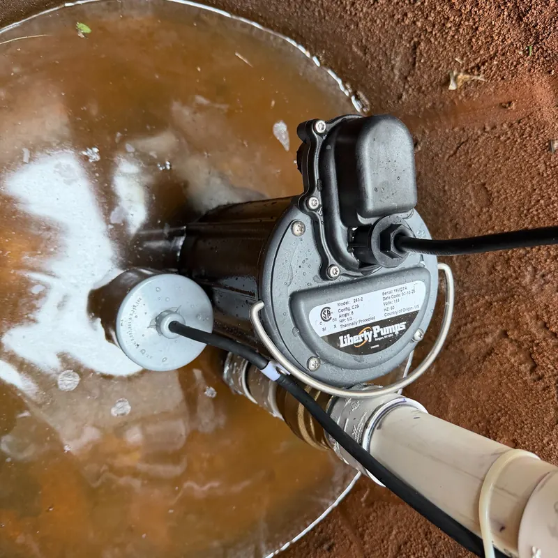 Storm sump pump installed inside a residential sump basin