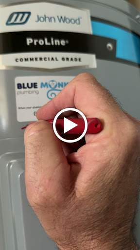 Video thumbnail showing the installation date being marked on a John Wood electric water heater in Ambleside